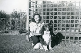 Suey Ying Jung (Laura) crouching with dog, [between 1950 and 1955] thumbnail