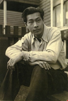 Chan Kow Hong posing in front of a house, [1950] (date of original), copied 2017 thumbnail