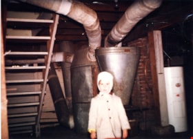 Sawdust burner in basement of Mawhinney house, 1962 thumbnail