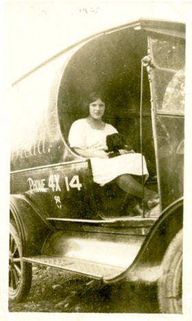 Edith Metcalf sitting on a bakery truck., 1923 thumbnail