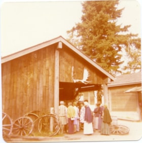 Visitors at the blacksmith shop at the Heritage Village Museum., [197_] thumbnail