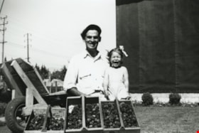 John and Janice Wuzinski with strawberries, 1951 thumbnail