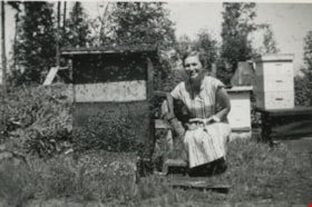 Frances Wuzinski with a bee hive, [1951] thumbnail