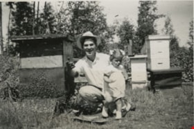 John and Janice Wuzinski with the family’s bee hives, [1951] thumbnail