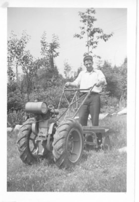 Paul Kuly with a tractor, [between 1950 and 1965] thumbnail
