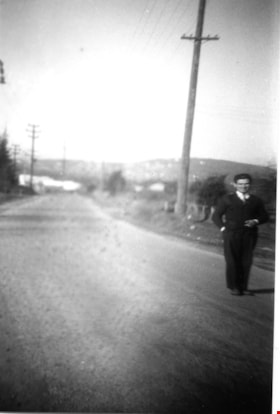 John Wuzinski paved street in front of Wuzinski property on Hastings Street, 1944 thumbnail