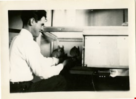 John Wuzinski with chincillas, 1950 thumbnail