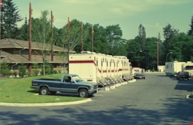 Dressing room trailers in Burnaby Village Museum parking lot, 11 Jul. 1990 thumbnail