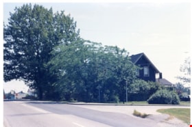 Corner view of Love farmhouse, [between 1966 and 1970] thumbnail