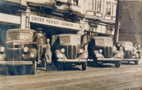 Workers and their trucks outside of United Fraser Growers, [between 1938 and 1945] (date of original), 2019 (date of duplication) thumbnail