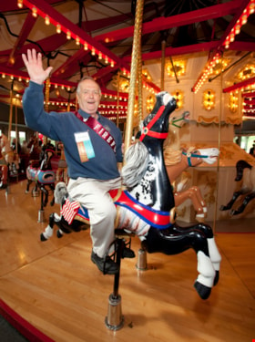 Barry Gaston and carousel horse named Firefly at Carousel's 100th Anniversary Event, May 5, 2012 thumbnail