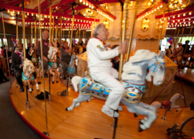 Don Wrigley and cacarousel horse named Captain Julius at Carousel's 100th Anniversary Event, May 5, 2012 thumbnail