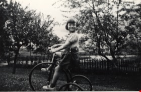 Louise Irwin riding tricycle, [1933] (date of original), copied 2004 thumbnail