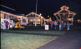 Buildings on Hill Street with Christmas lights, Dec. 1991 thumbnail