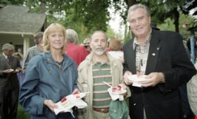 Officials holding Canada Day cake, July 1997 thumbnail