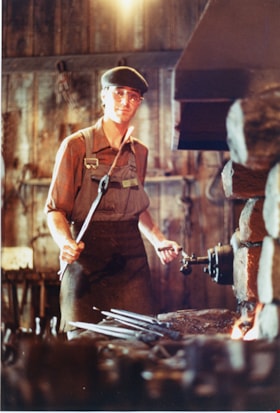 Eric Damer in blacksmith shop, [1992] thumbnail