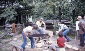 Sawing a log at Heritage Village, 1976 thumbnail