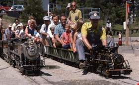 Riding minature locomotives at Heritage Village, [197-] thumbnail