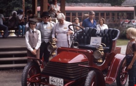Visitors gathered around vintage automobile, [1978] thumbnail