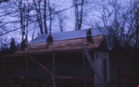 Re-shingling roof of Whitechurch Hardware building, Feb. 1975 thumbnail