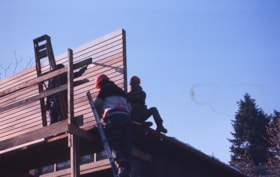 Replacing false front of Whitechurch Hardware building, Feb. 1975 thumbnail