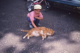 Child with Morris the cat, [1987] thumbnail