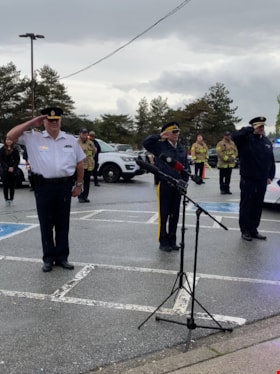RCMP officers saluting with firefighters, 12 May 2020 thumbnail