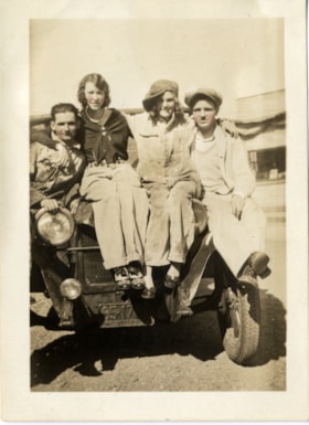 Naida, Margaret and Fred Knight on hood of automobile, [193-] thumbnail