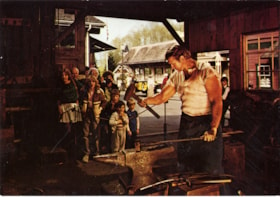 Heritage Village Museum blacksmith shop postcard, Dec. 1984 thumbnail