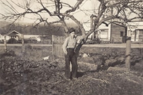 Gordon Jung on family farm, [between 1935 and 1945] thumbnail