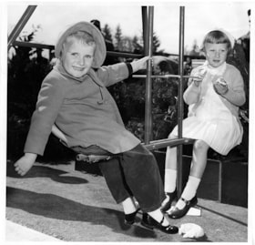 Children on teeter totter, 5 May 1954 thumbnail