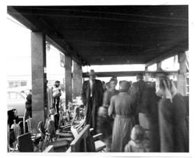 Entrance to Simpsons-Sears with furniture and shoppers, [1954] thumbnail