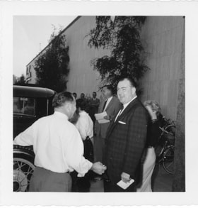 T. Boyd Haskell with crowd near vintage automobile, [1958] thumbnail