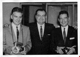 T. Boyd Haskell with two men holding cameras, 1959 thumbnail