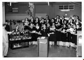 Choir performing inside Simpsons-Sears, [1958] thumbnail