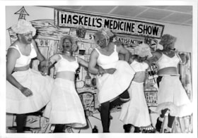 Men dressed as women performing on stage, [1959] thumbnail