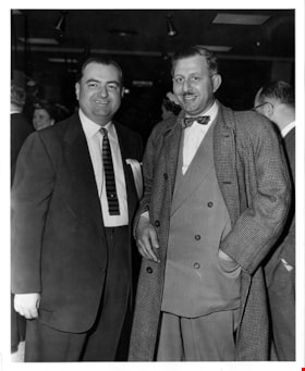 Haskell with man at Simpsons-Sears opening, 5 May 1954 thumbnail