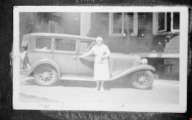 Woman standing alongside automobile, [194-] (date of original), copied 1996 thumbnail