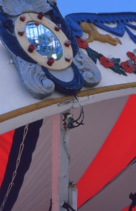 Detail of decorative mirror on rooftop of C.W. Parker no. 119 carousel at PNE, 1989 thumbnail