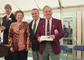 Don Wrigley receiving award at opening ceremonies for carousel, 27 Mar. 1993 thumbnail