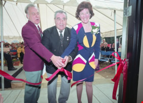 Ribbon cutting at opening ceremonies for carousel, 27 Mar. 1993 thumbnail