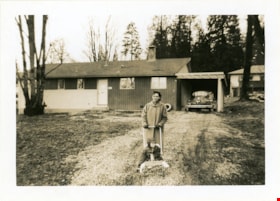 Lucy and Sjouke Hiemstra in front of house, Feb. 1960 thumbnail