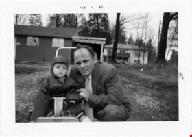 Cor and Sjouke Hiemstra in front of house, Feb. 1960 thumbnail