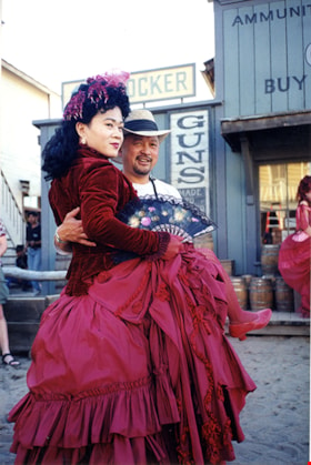 Jimmy Chow with saloon girl on the set of  thumbnail