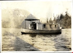 Boat anchored on a lake, [190-] thumbnail