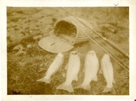 Fish with fishing basket and fishing rods, [c. 1915] thumbnail