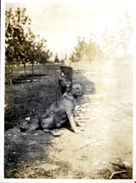 Child with dog, [190-] thumbnail
