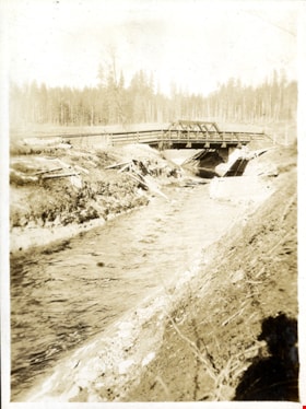 Bridge over fast flowing river, [c. 1910] thumbnail