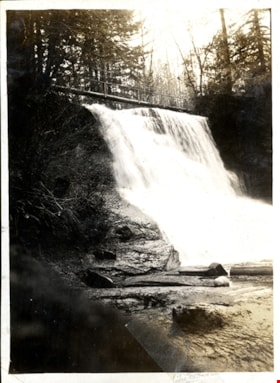 Waterfall with narrow bridge over top, [c. 1910] thumbnail