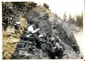 Men on rocky shore, [c. 1915] thumbnail